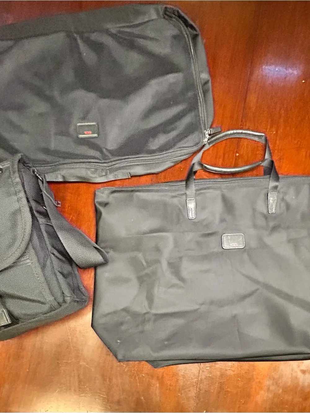 Tumi Black Nylon 3-Piece Messenger and Carry Bag Set